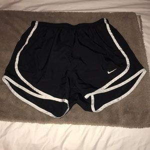 Black Nike Dri-fit shorts.
